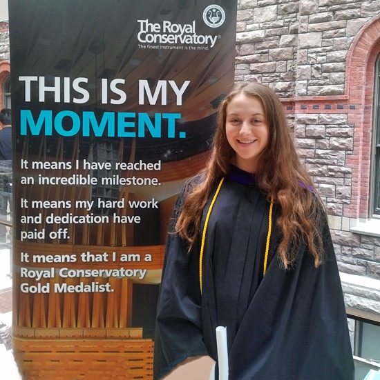 Teenage student receiving an RCM piano gold medal